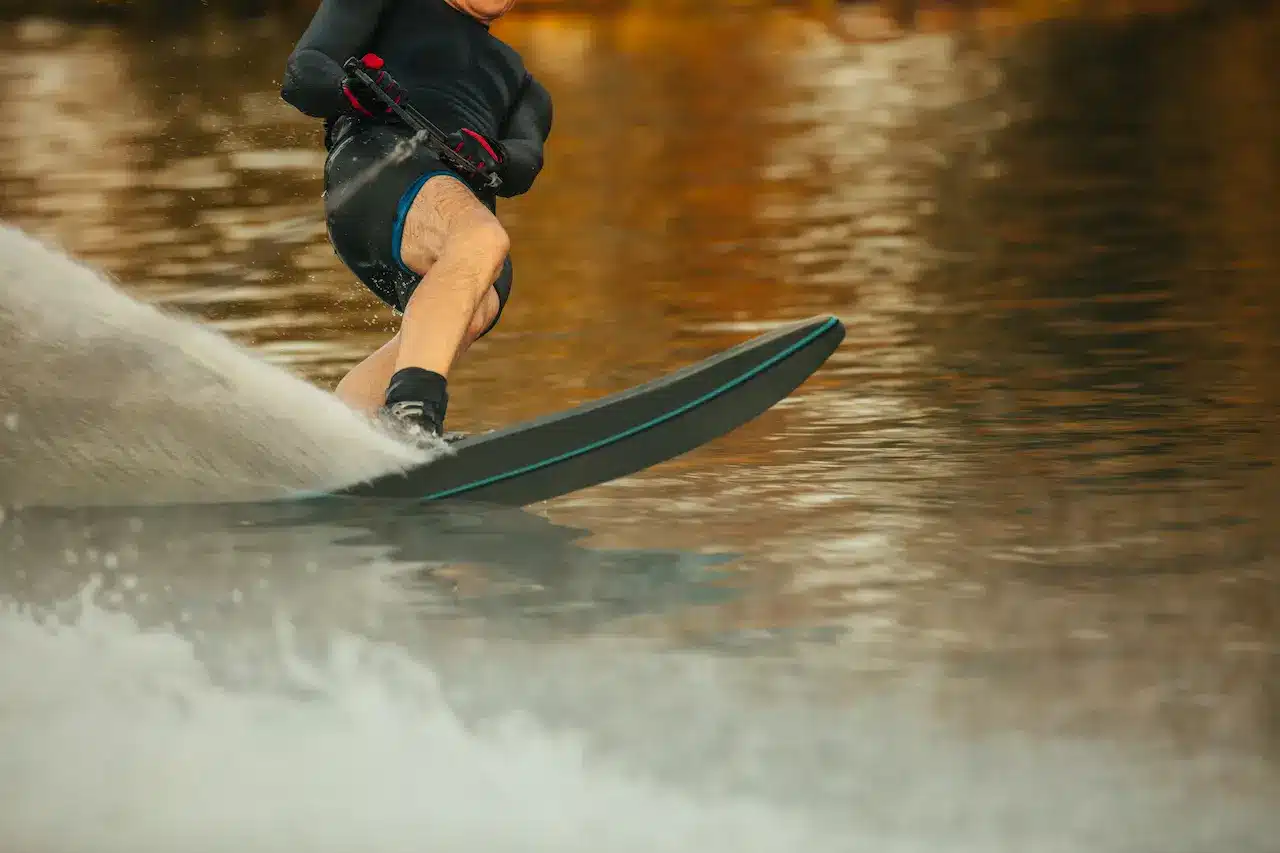 Man Riding Wakeboard on a Lake